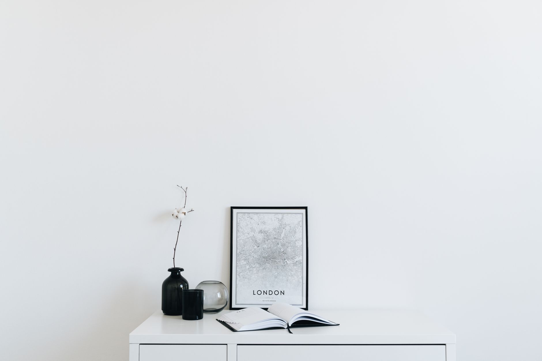 A minimal, curated shelf styled with considered objects